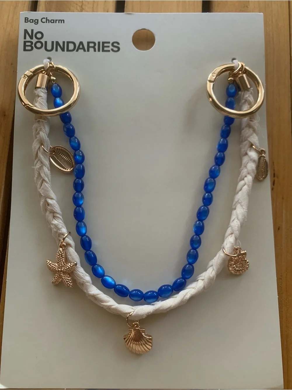 NWT Gold Bag Charm Necklace with Blue Beads and White Braid